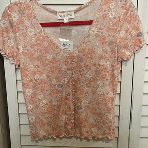 peachish pink top with flowers and buttons, size Medium